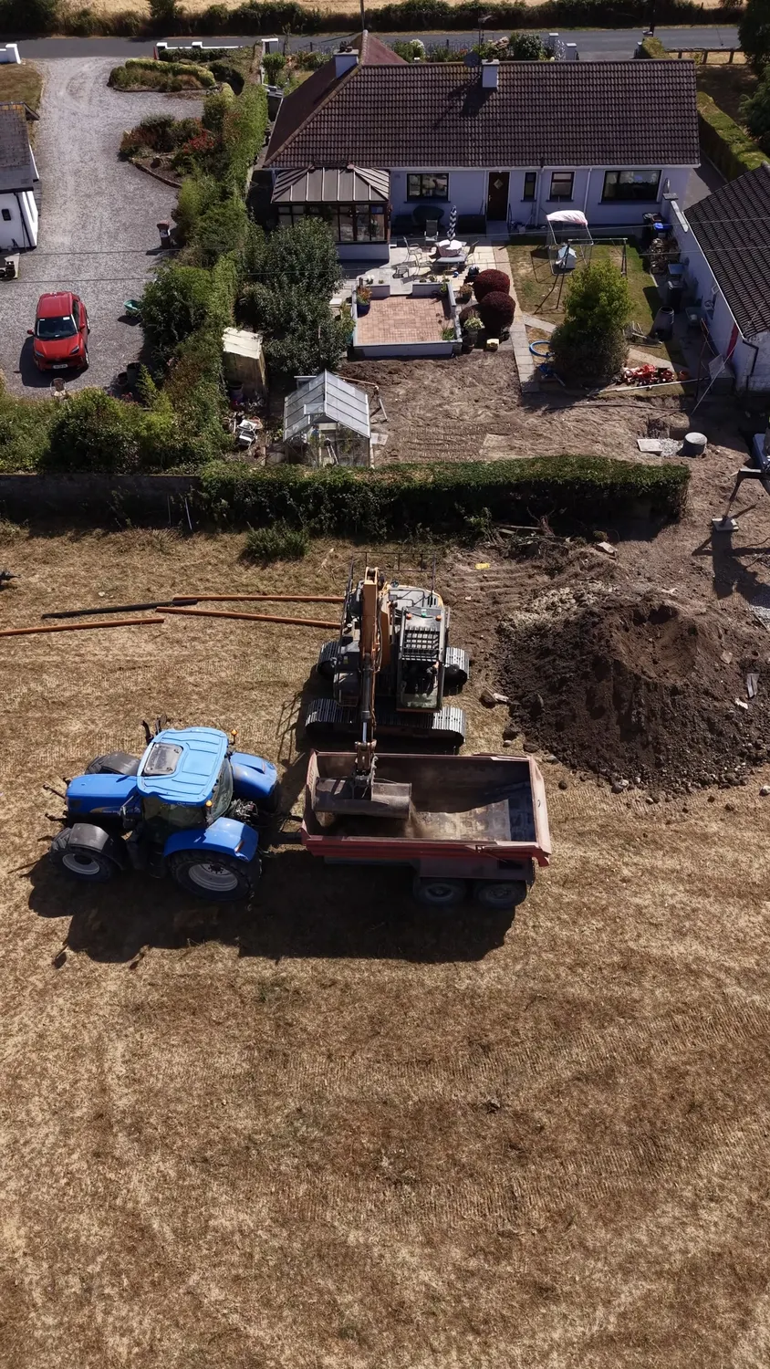 Freshly levelled soil across a residential garden
