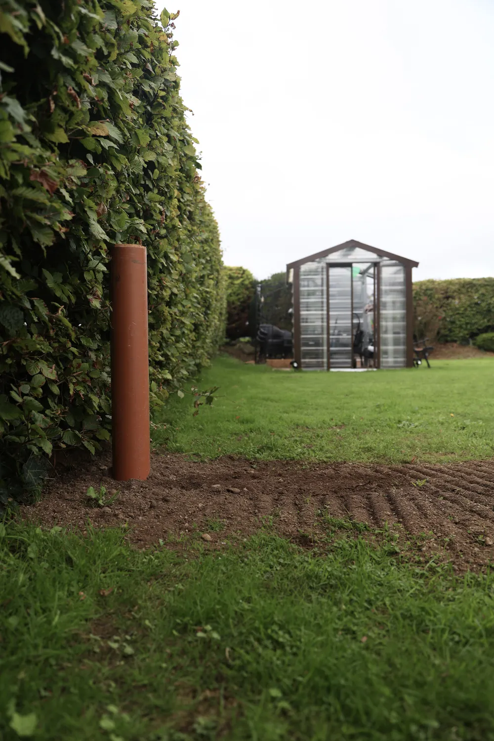Freshly prepared soil in a large residential garden