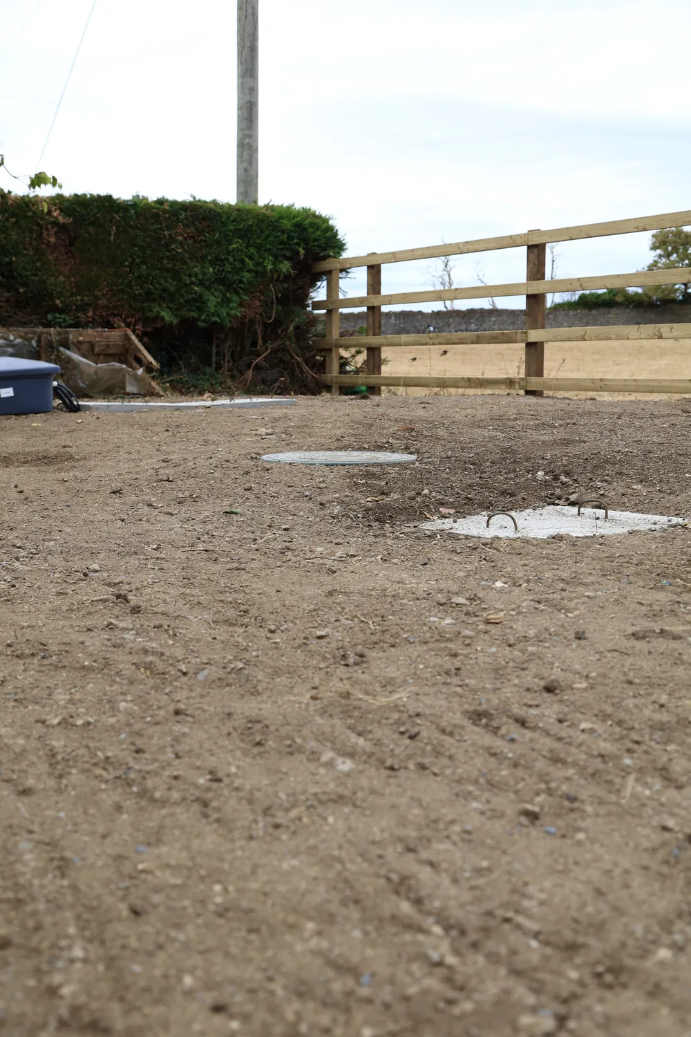Top-down view of a cleared and graded garden plot